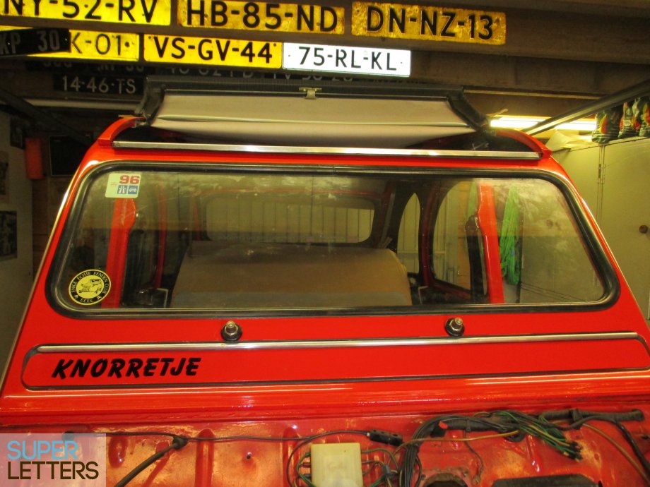 naamstickers | Plakletters op auto